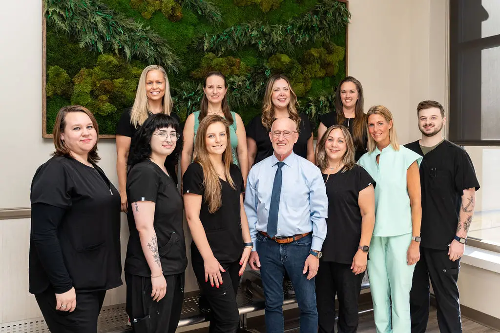 The staff of Mixed Pet Veterinary Hospital in the lobby.